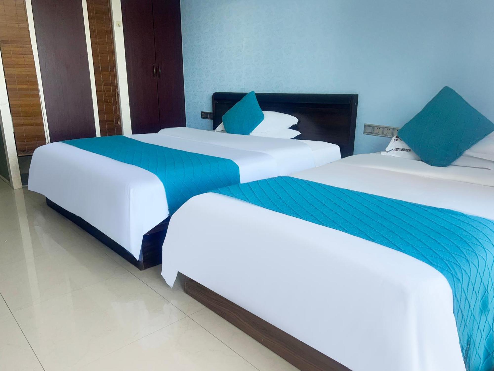 Sanya Sun&Sea Gueshouse Aparthotel Bagian luar foto