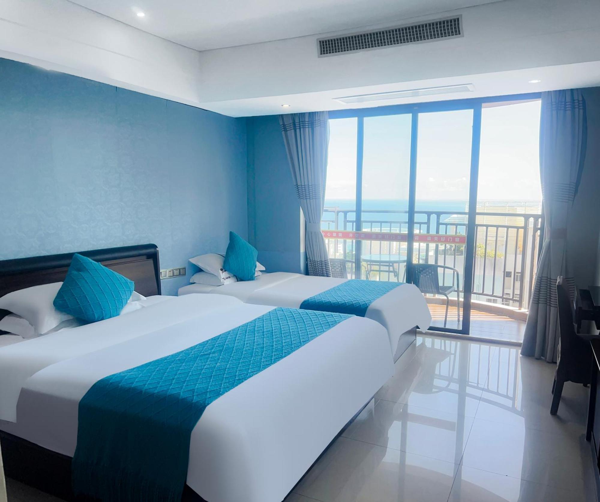 Sanya Sun&Sea Gueshouse Aparthotel Bagian luar foto